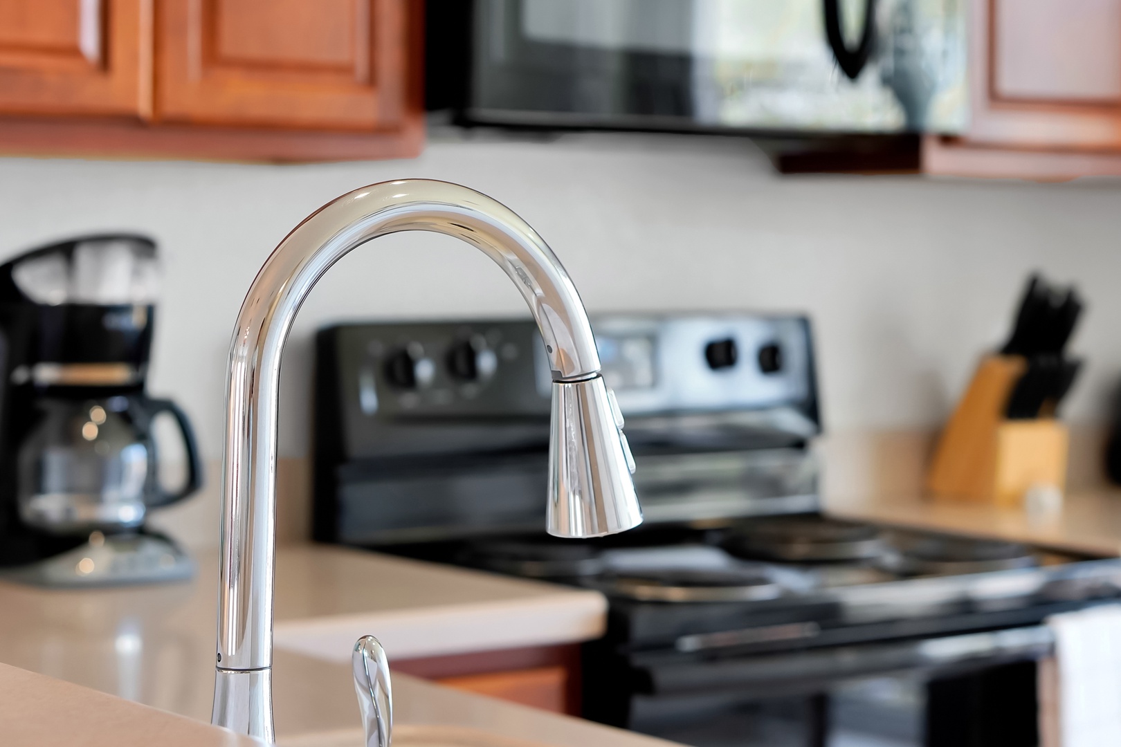 Your fully equipped kitchen features modern appliances and sleek finishes, perfect for preparing home-cooked meals during your stay.