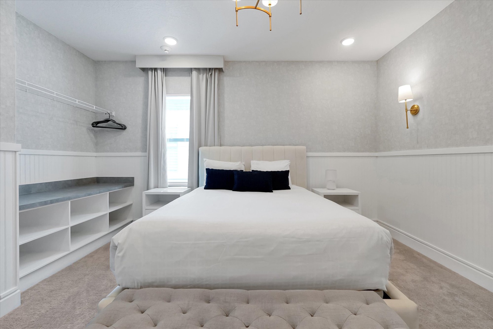 Slip into crisp linens and sink into plush comfort in your elegantly appointed bedroom, where soft lighting and a serene palette create the perfect retreat for restful nights.