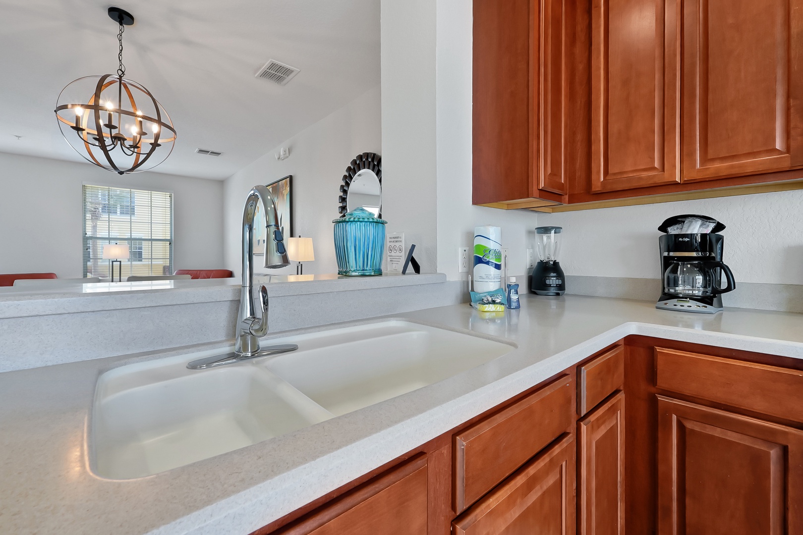 Your fully equipped kitchen features warm wood cabinets, quartz counters, and everything you need to prepare delicious meals during your stay.