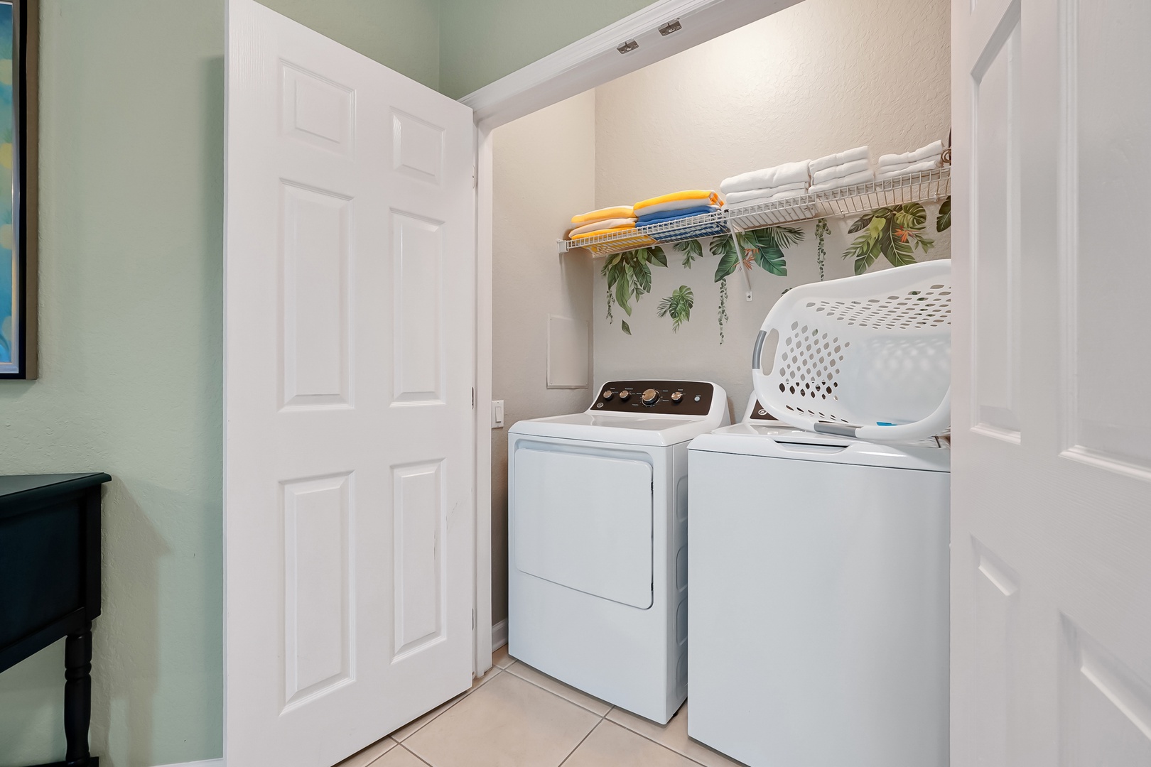 Your private laundry room makes extended stays effortless with full-size washer and dryer, plus organized storage for all your essentials.