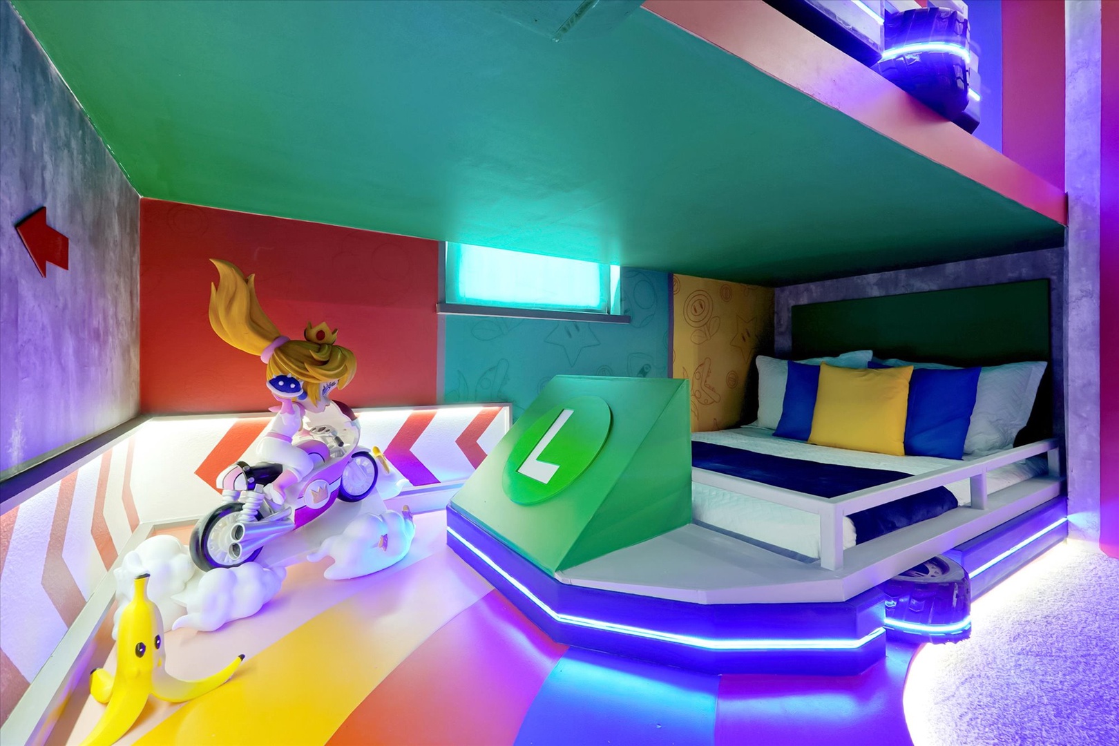 Step into a vibrant, futuristic bedroom with LED-lit platforms, bold geometric décor, and playful pop art touches that create an immersive, high-energy escape.