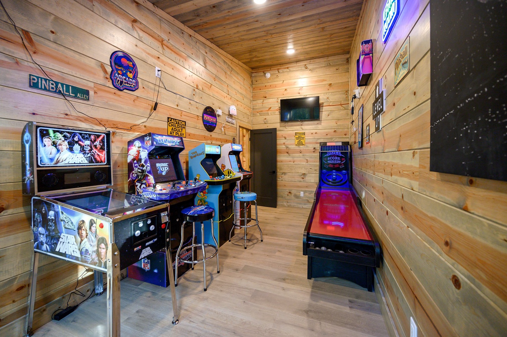Adults and kids will love this arcade room!