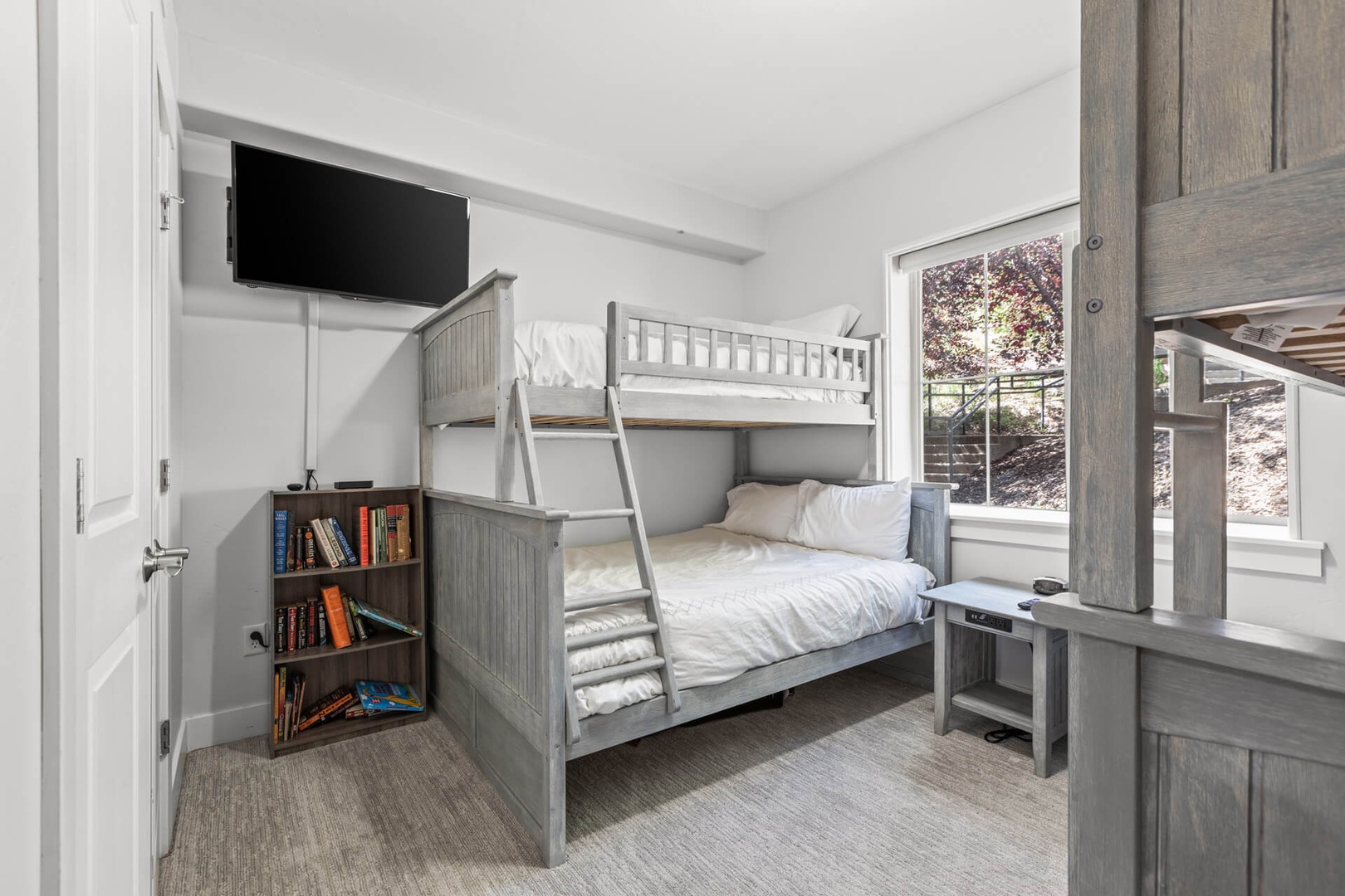 Bear Hollow Lodges 4203: THIRD BEDROOM is a bunk room with a twin-over-full-size bunk as well as a twin-over-twin-size bunk— so there’s sleeping space for five.