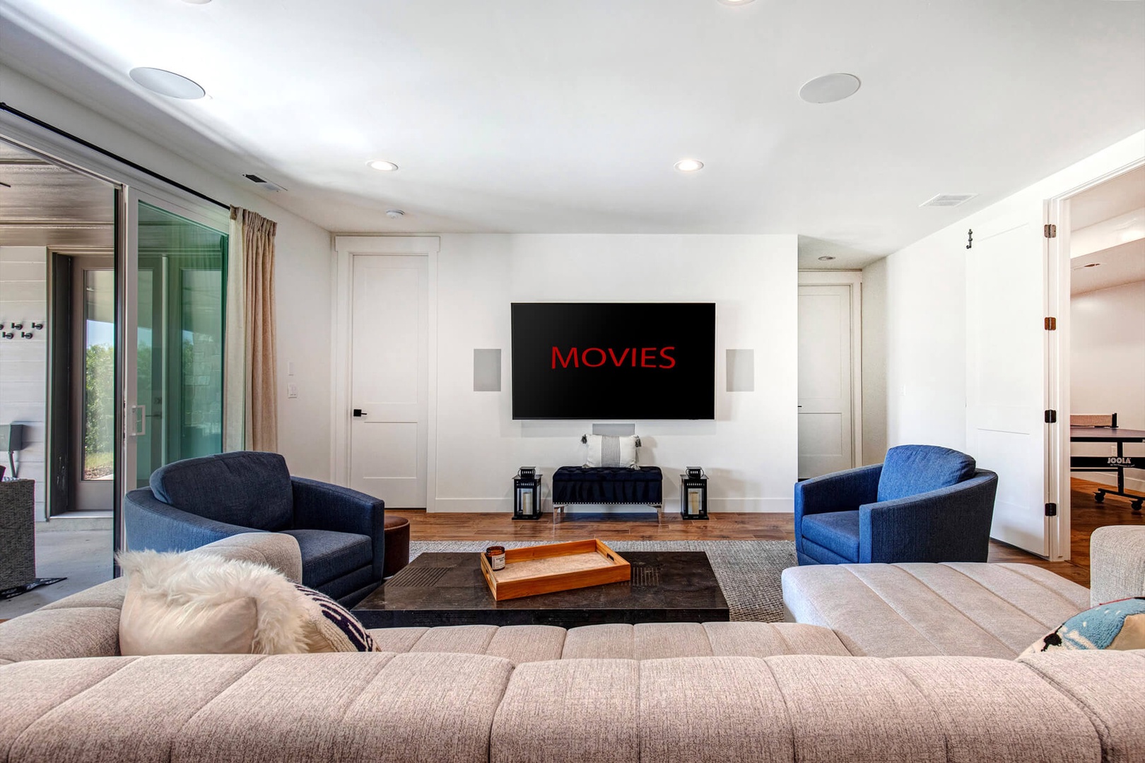 Lower Level Family Room - Large HD Smart TV, plenty of seating, patio access