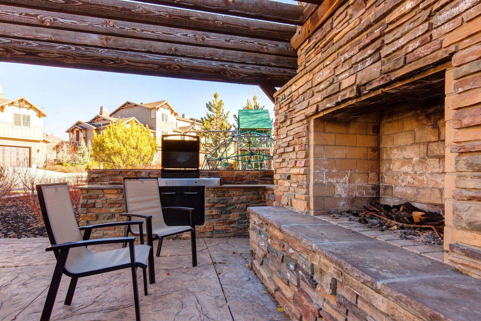 Parks Edge Community Outdoor Wood Burning Fireplace & BBQ Area