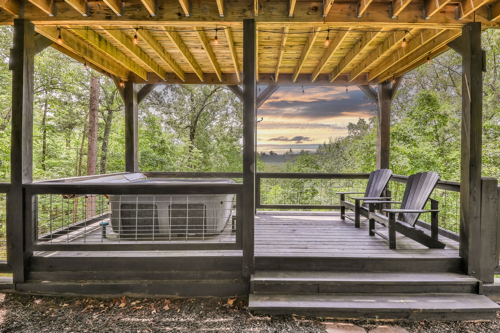 Covered Hot tub with fenced in area