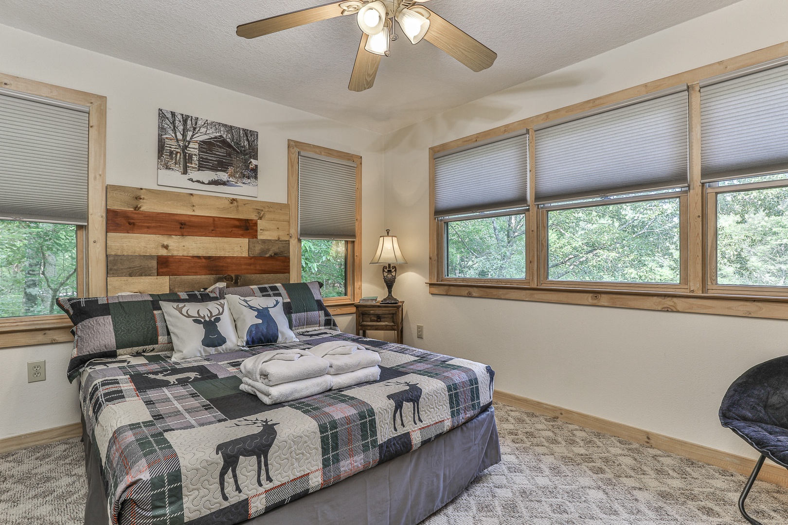 Queen Bedroom on upper level with private bath