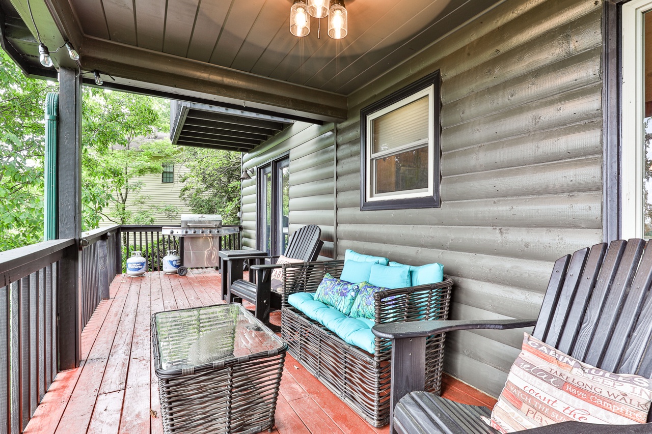 Covered porch and uncovered deck for relaxing and grilling on main level