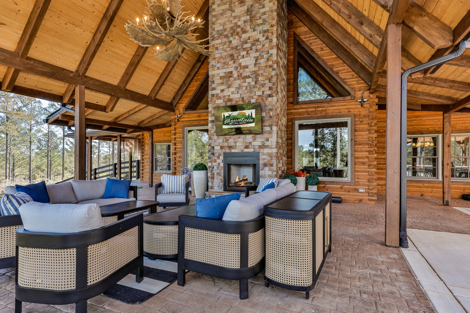Outdoor Living Room with wood burning fireplace