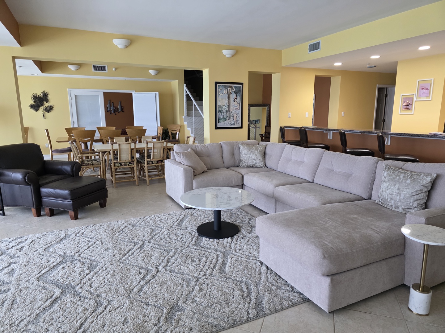 Sink into this spacious sectional sofa and unwind in your open-plan living area, perfect for gathering with loved ones.