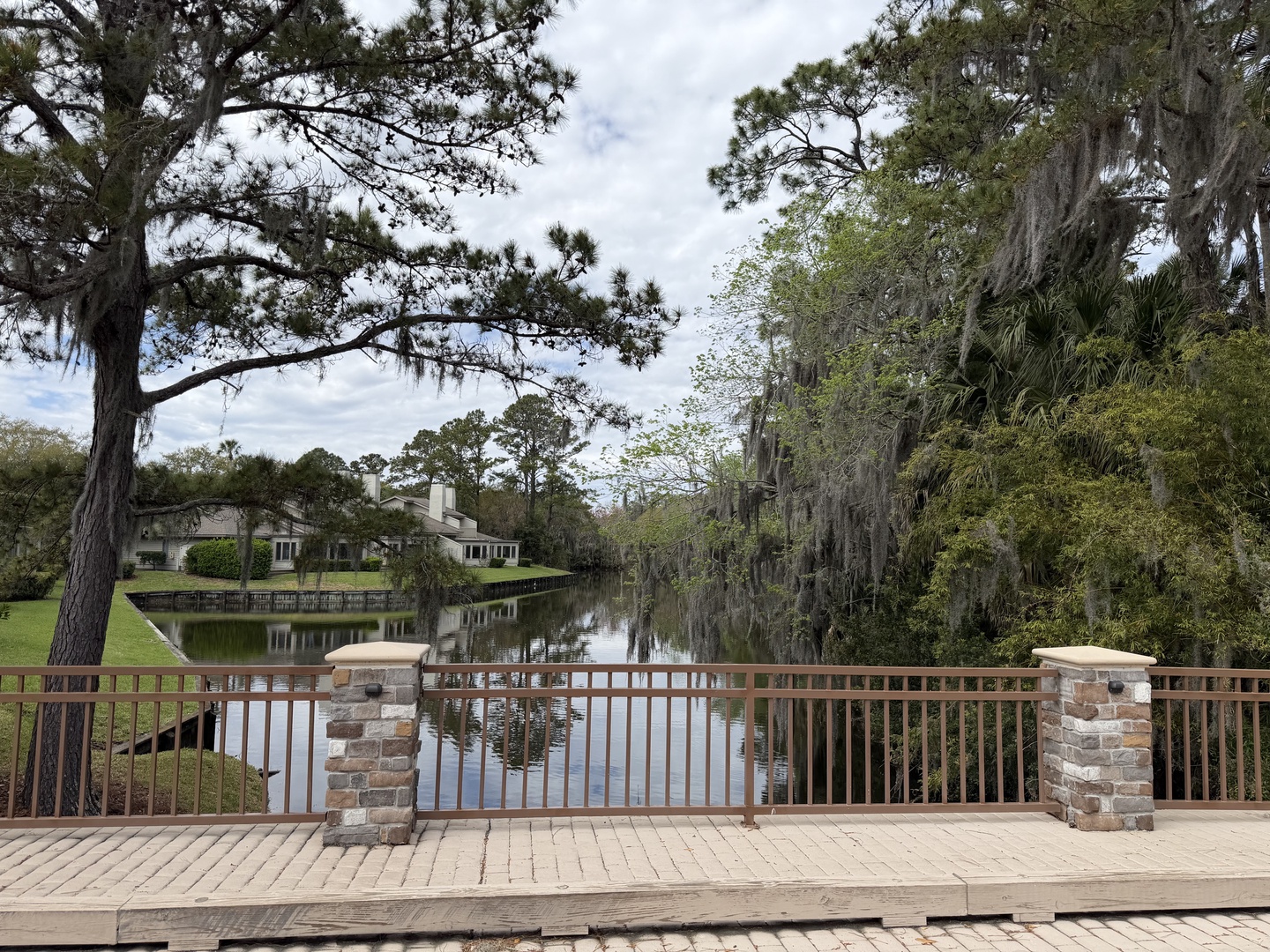 Peaceful waterfront location with scenic lake views and natural landscaping surrounding the property area.