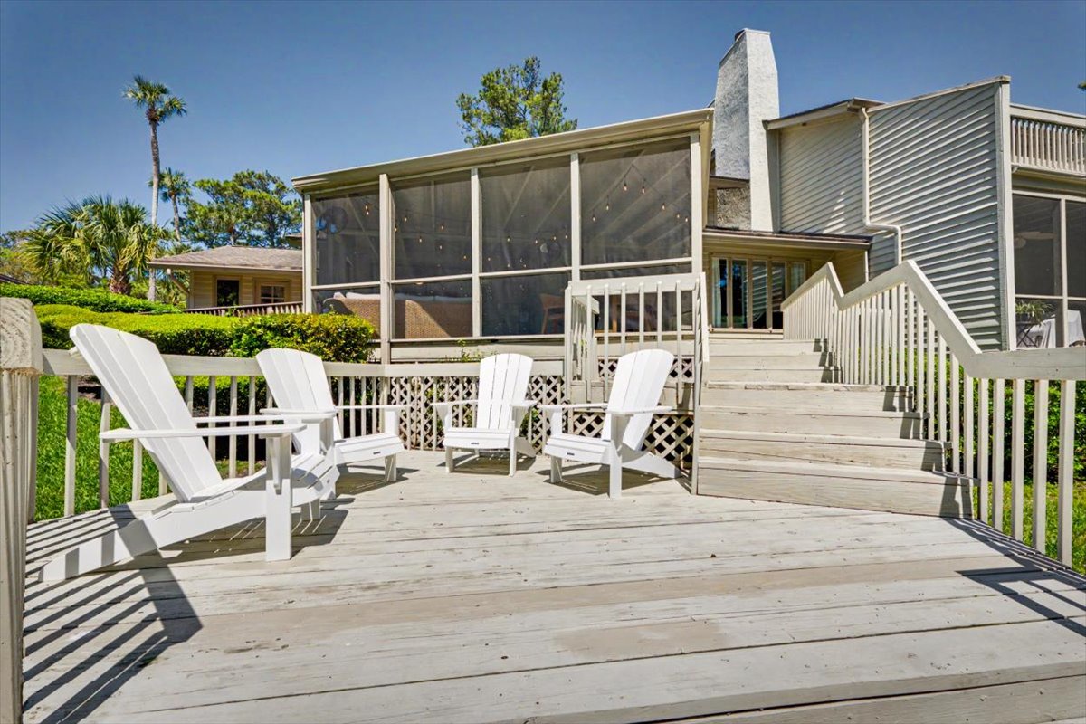 Your private deck awaits with comfy Adirondack chairs, perfect for morning coffee or evening cocktails while enjoying the peaceful surroundings.