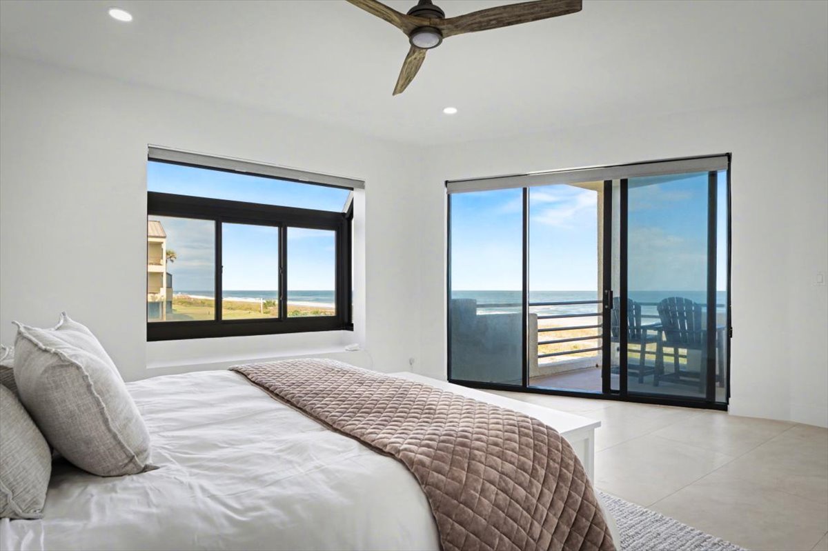 Wake up to stunning ocean views from your bright, airy bedroom with private balcony access and gentle sea breezes.