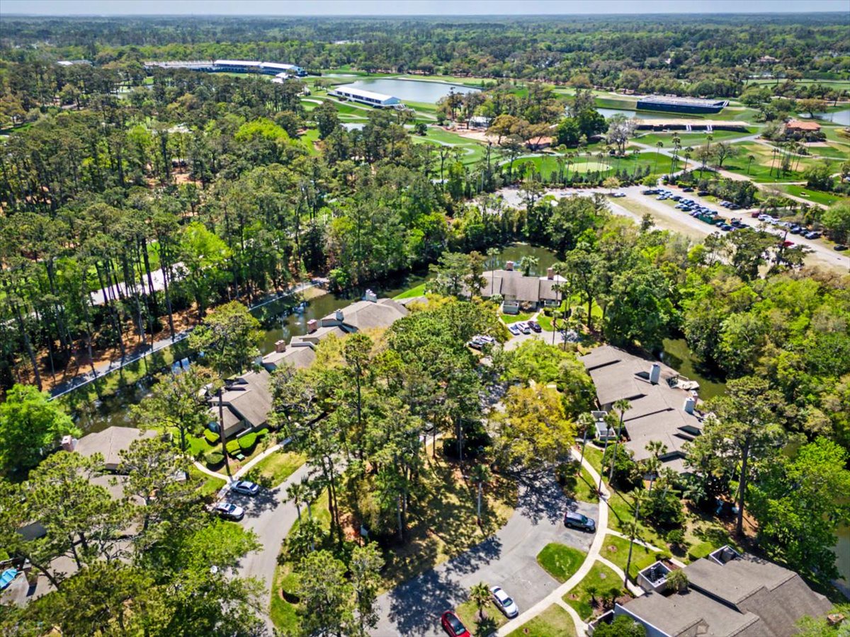 Property located in a tranquil tree-lined neighborhood adjacent to prestigious golf course fairways and recreational facilities.