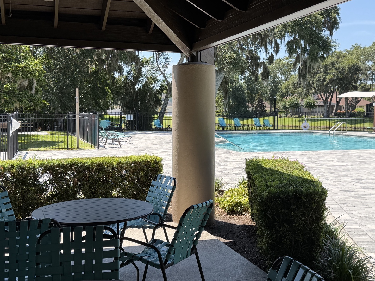 Step into your private oasis with a refreshing pool framed by graceful moss-draped trees. Relax in the shaded pavilion and soak up the tranquil Southern charm surrounding your stay.