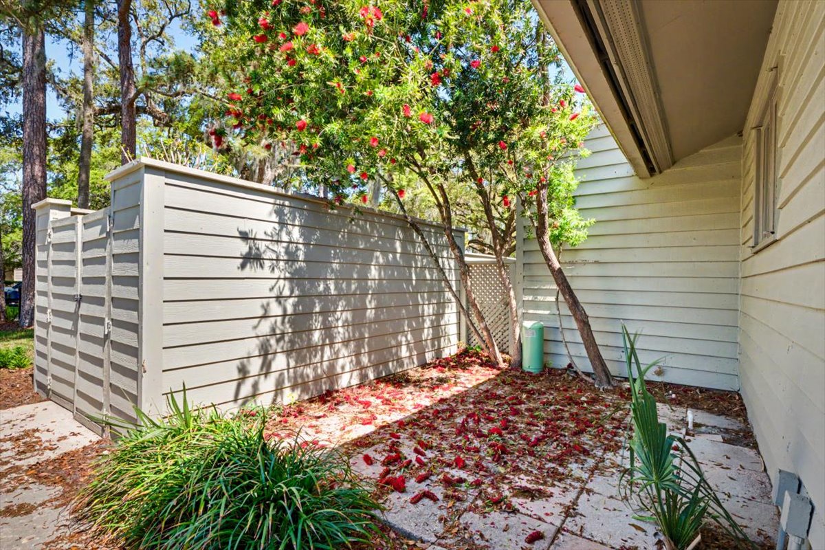 A charming private courtyard awaits with a blooming fruit tree creating your own peaceful garden retreat.