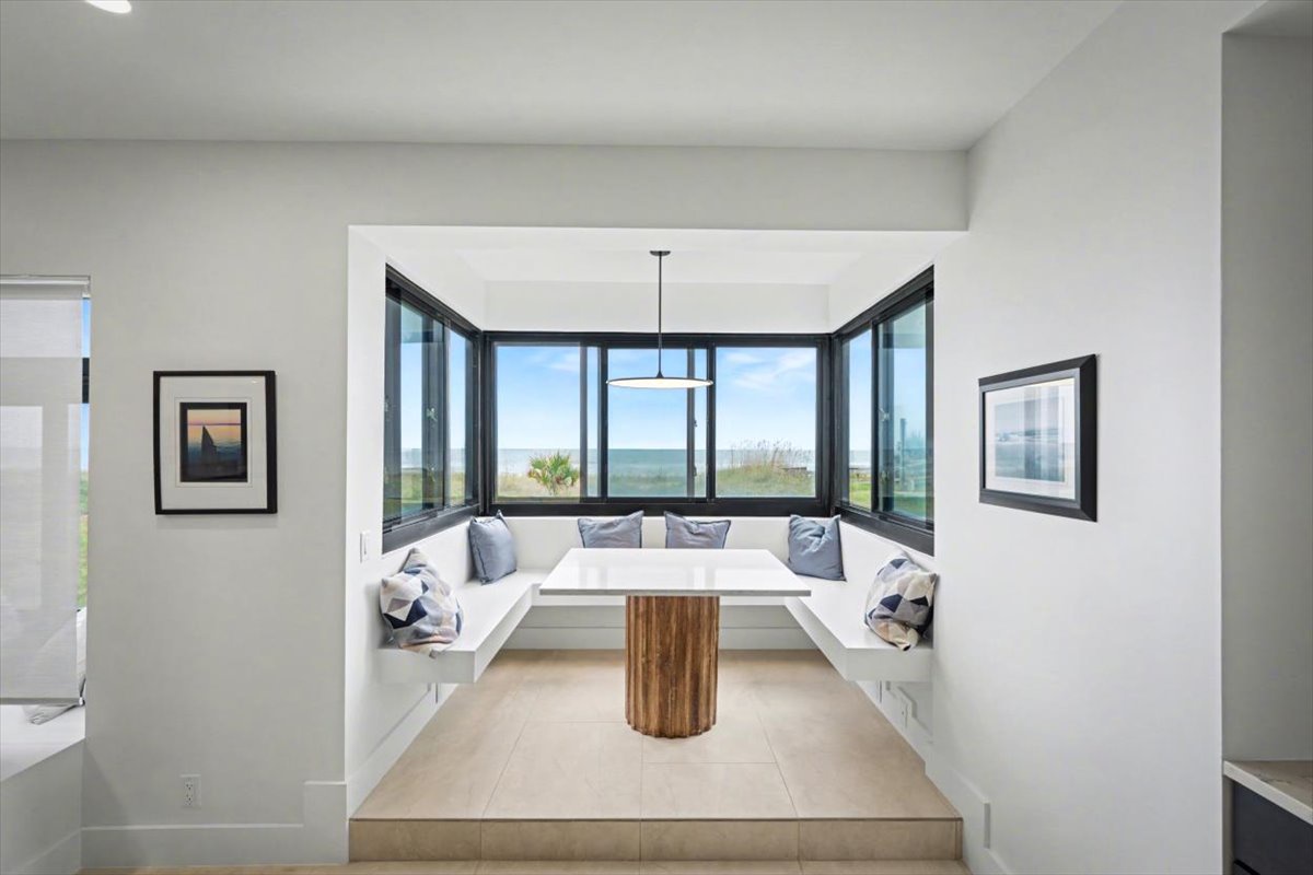Sink into plush seating while gazing at stunning ocean views from your private breakfast nook—perfect for morning coffee or evening relaxation.
