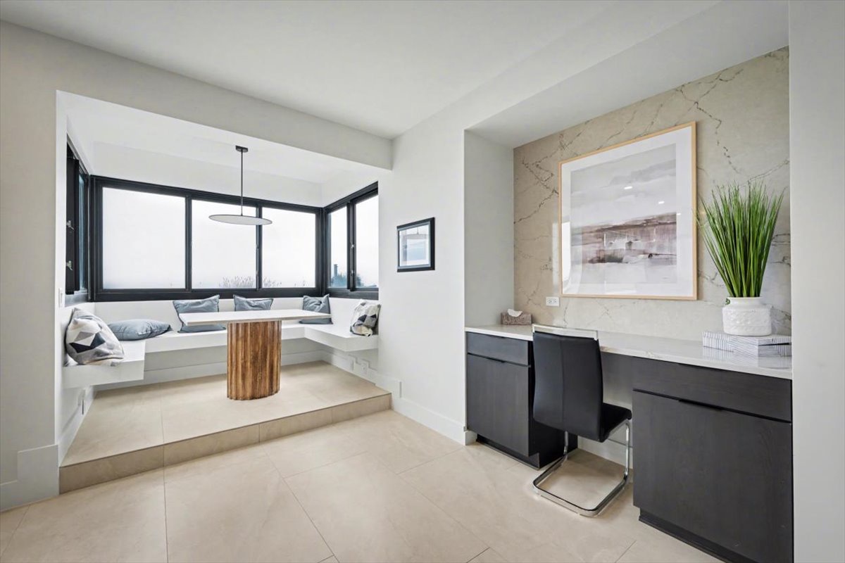 Unwind in your stylish seating nook with panoramic windows, or catch up on work at the sleek built-in desk.