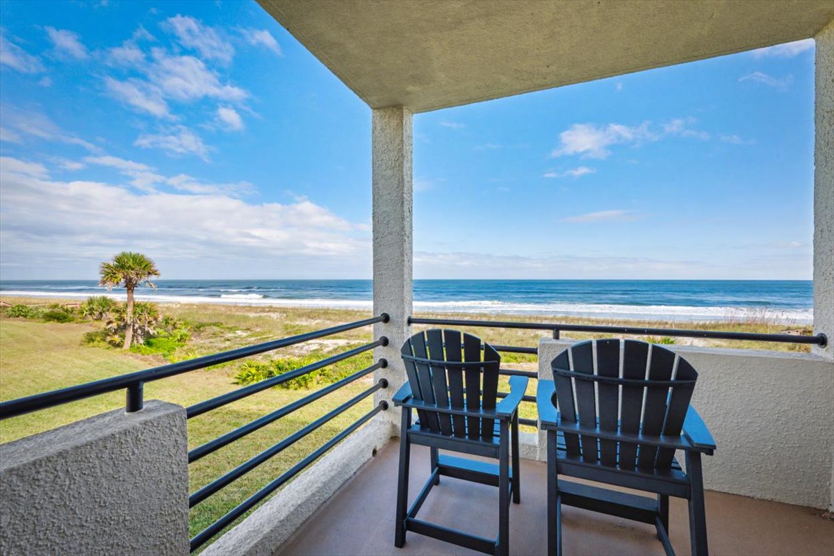 Sink into your private balcony chairs and watch waves roll onto pristine sand while palm trees sway in the ocean breeze.