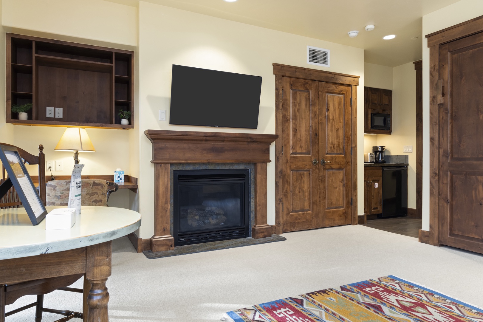 Second Living Area / Murphy Bedroom with Gas Fireplace