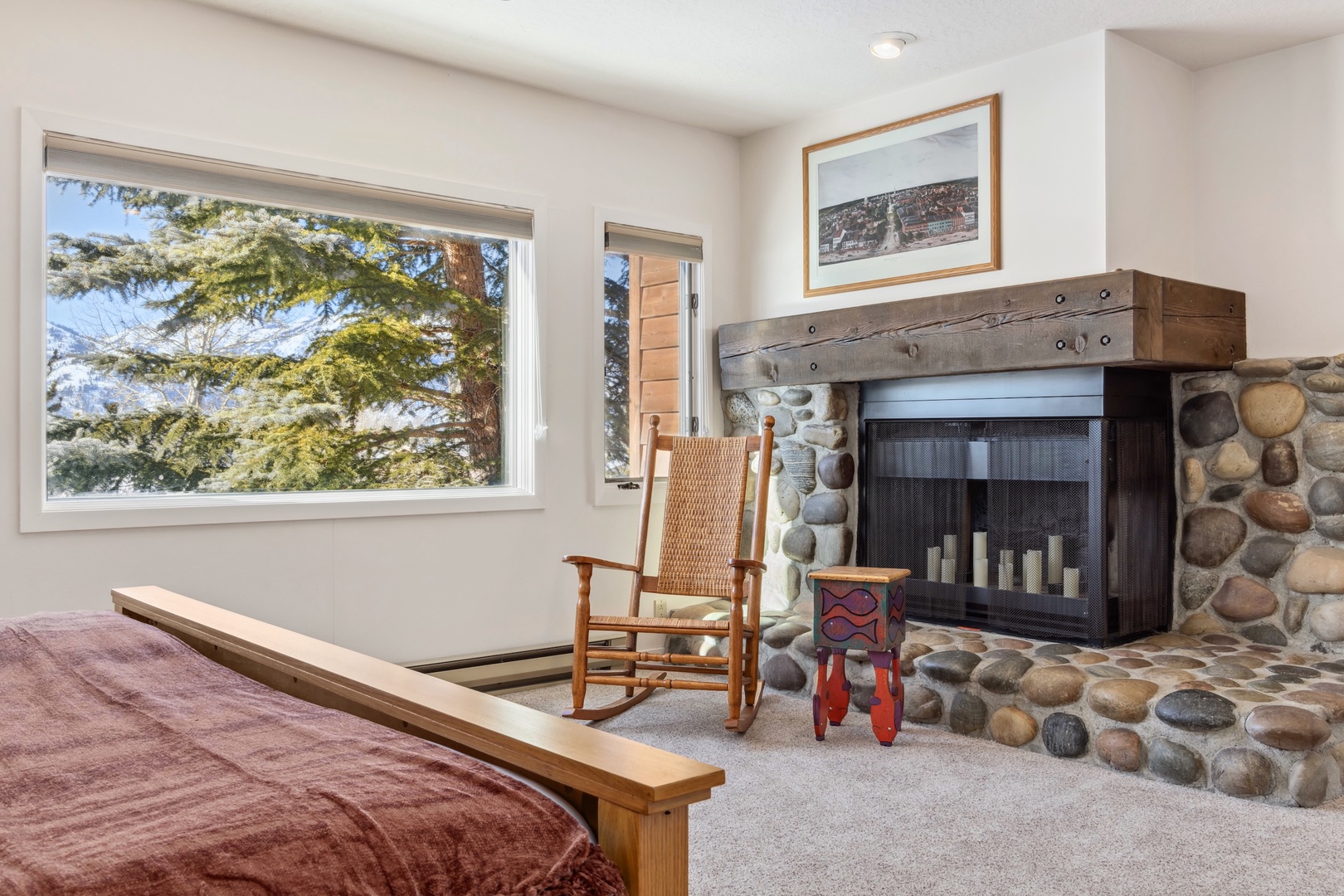 Primary Bedroom - Please note that the fireplace is not for guest use.