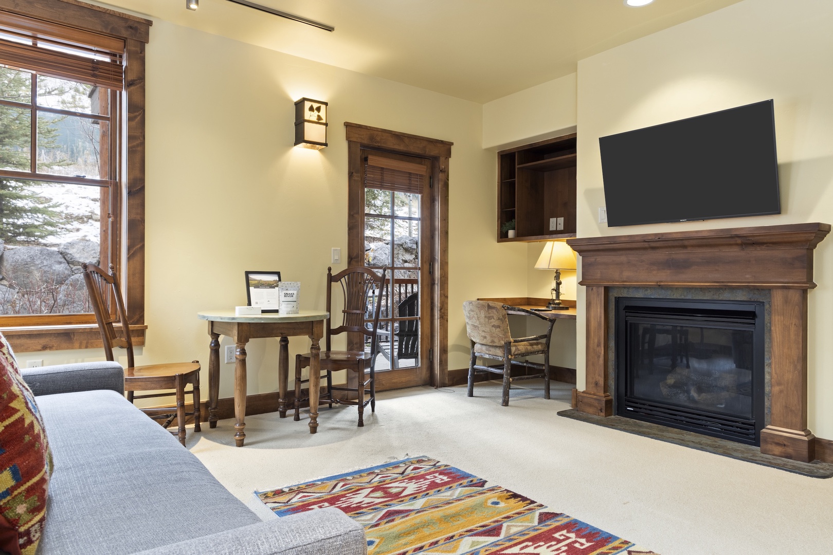 Second Living Area / Murphy Bedroom with Gas Fireplace