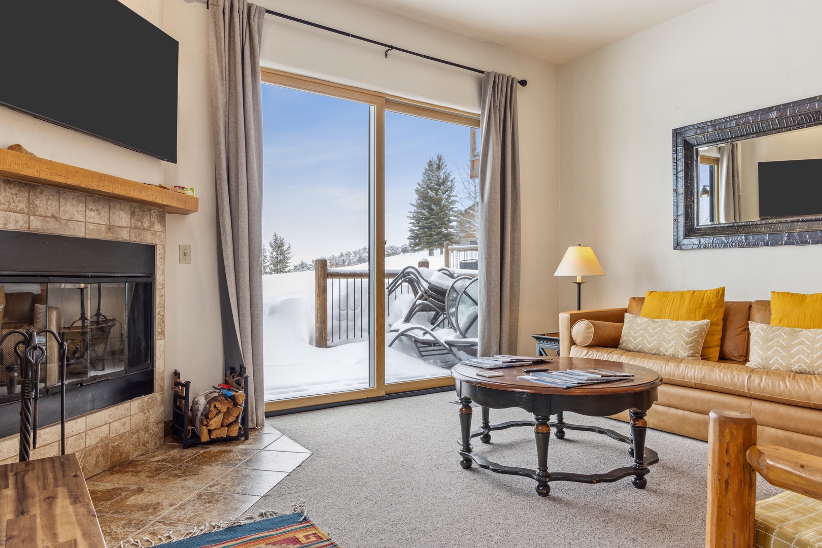 Living Room with Teton Views and wood burning fireplace