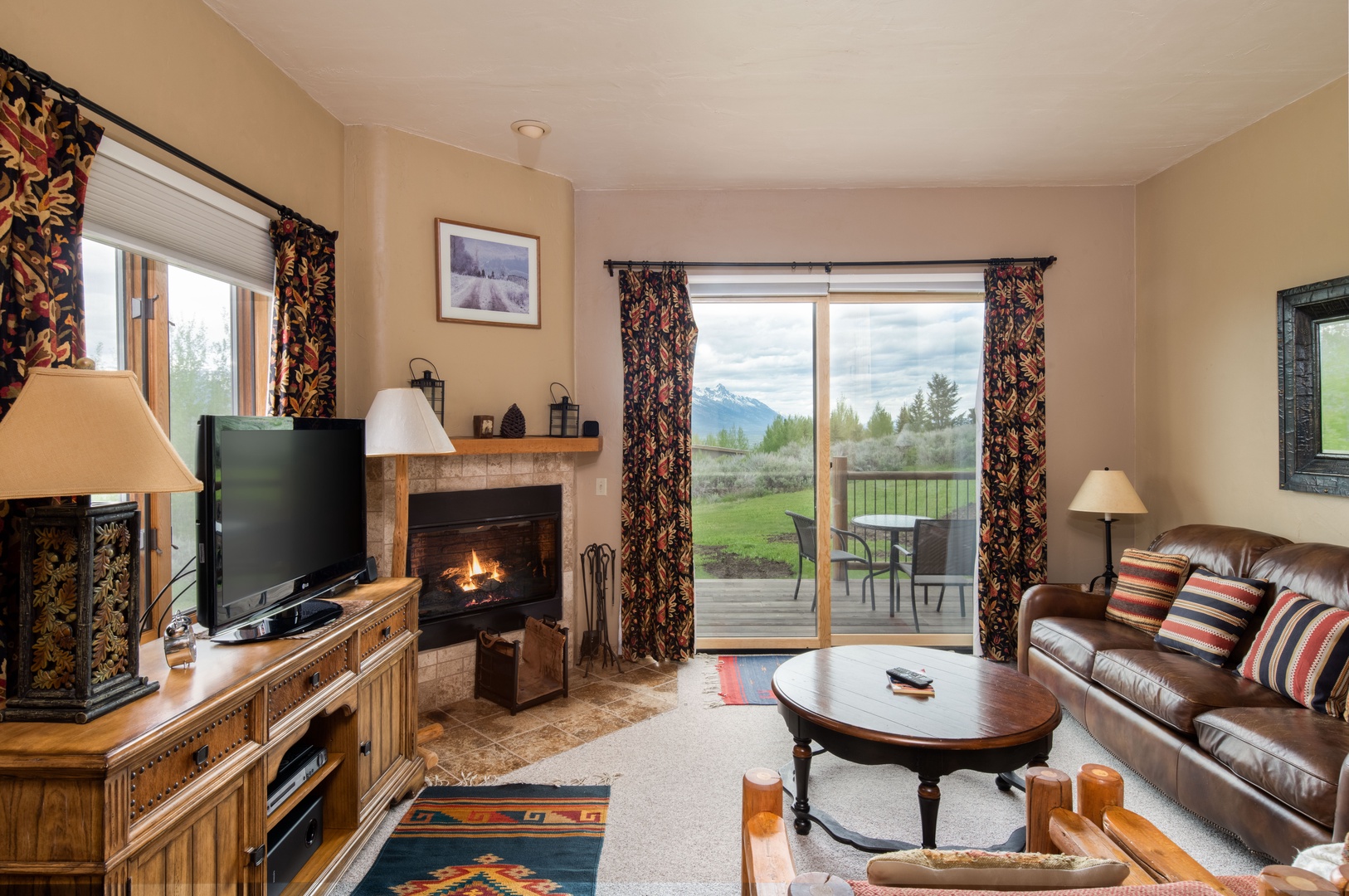 Living Room with Teton Views and wood burning fireplace