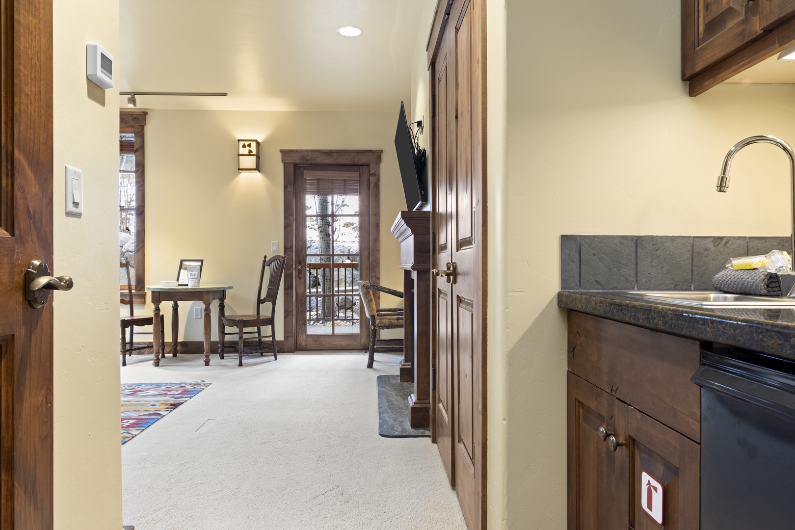 Second Living Area / Murphy Bedroom with Gas Fireplace