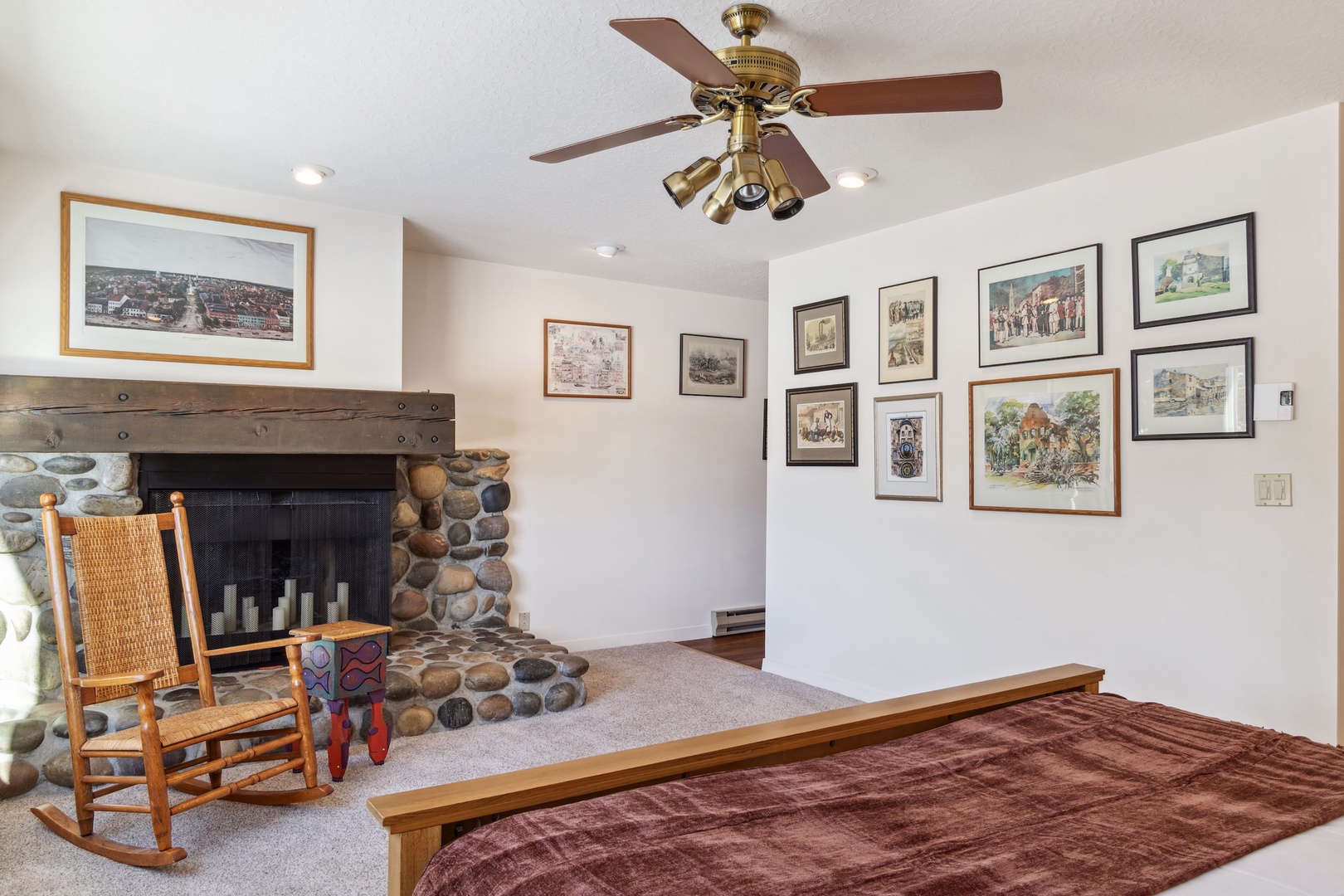 Primary Bedroom - Please note that the fireplace is not for guest use.