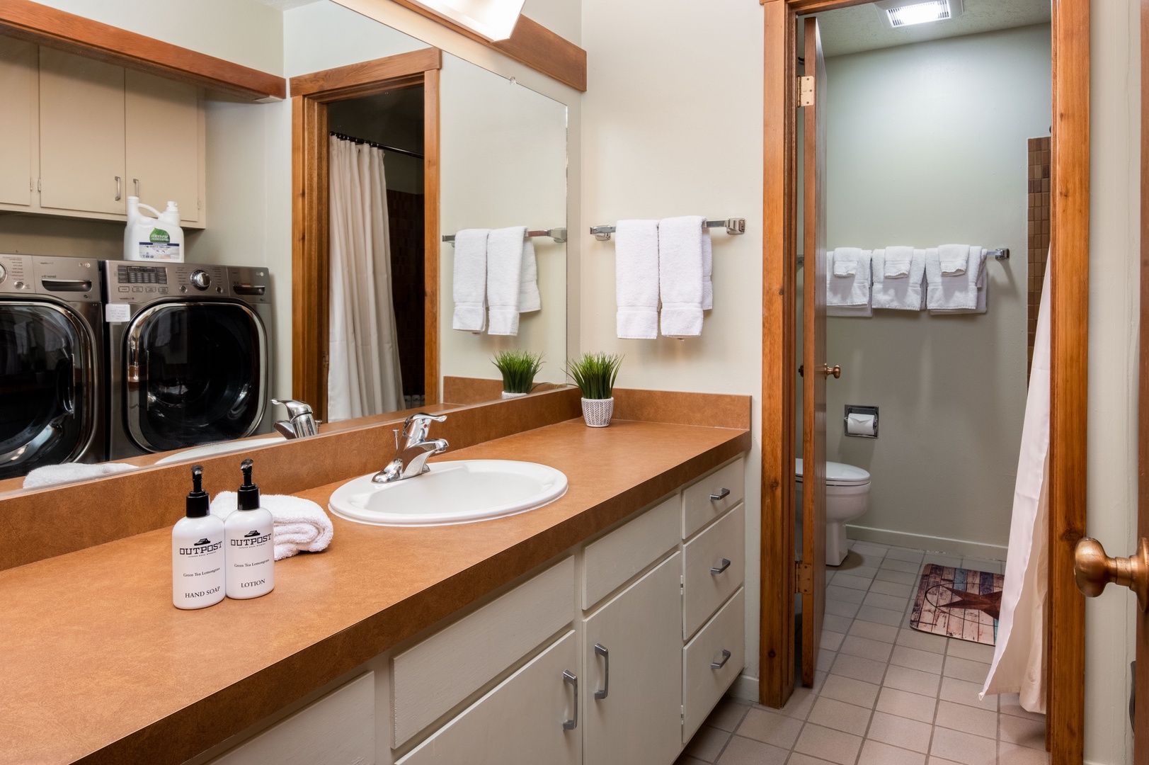 Secondary bathroom with Laundry