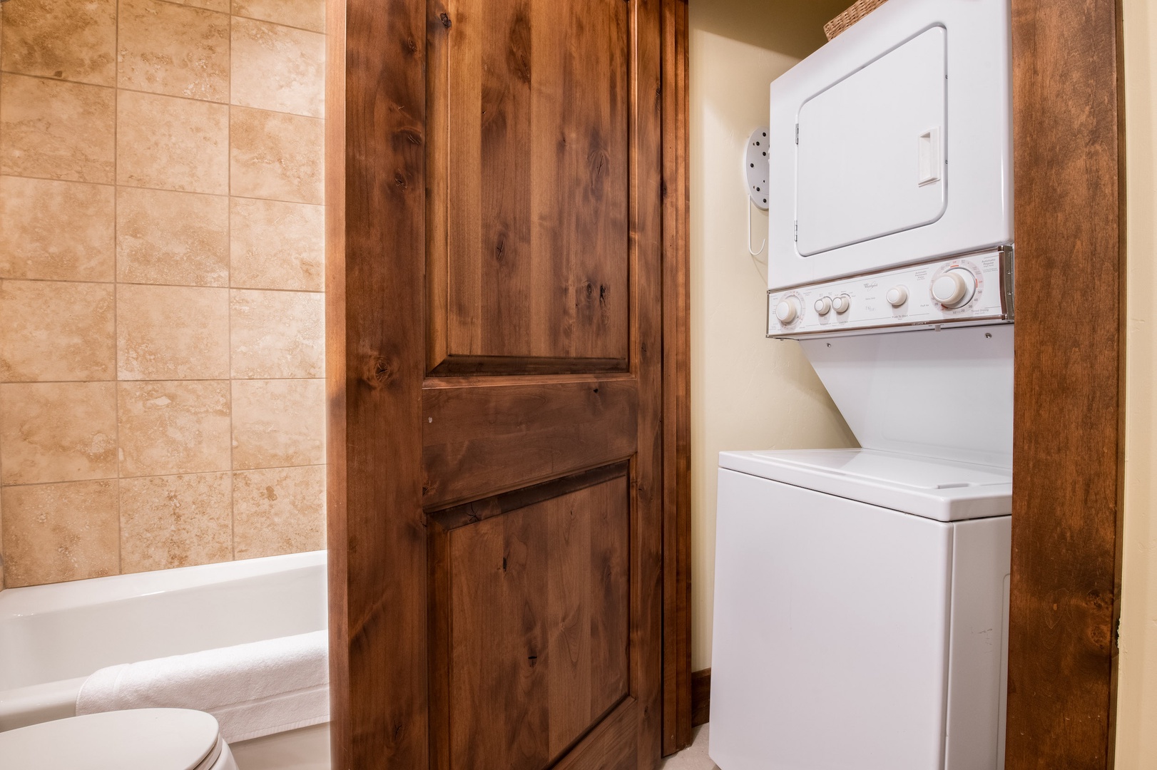 Secondary bathroom with laundry