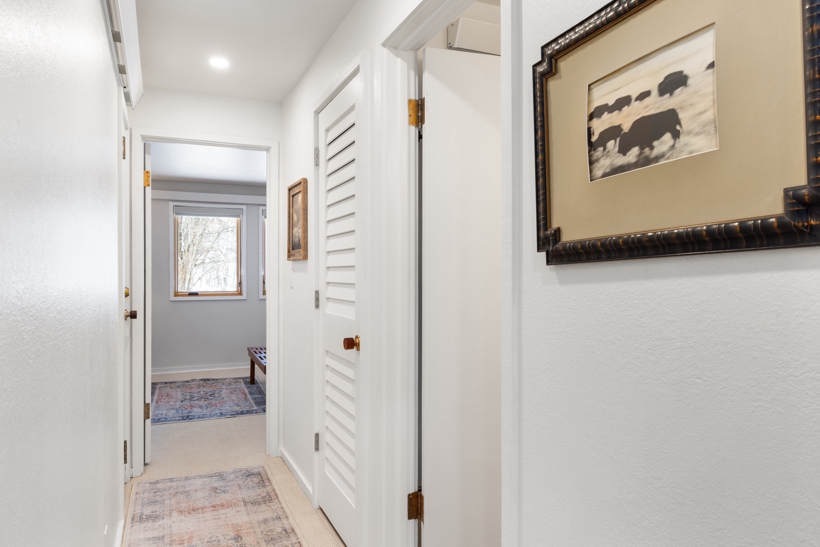 Hallway leading to Primary Bedroom and Guest Bedroom