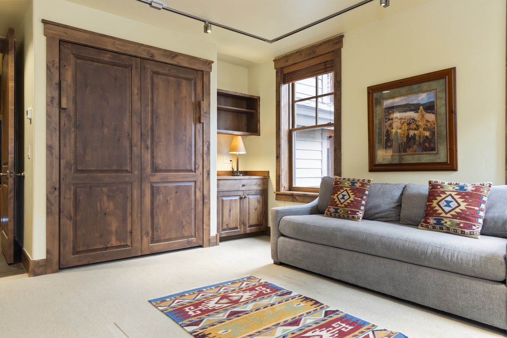 Second Living Area / Murphy Bedroom with Gas Fireplace