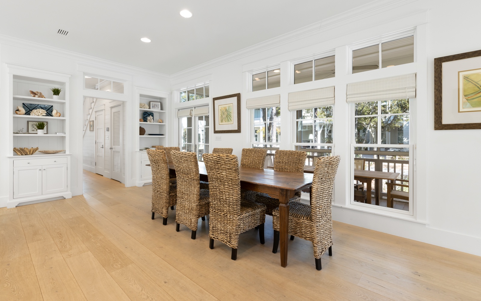 Gather around this beautiful dining table where memorable meals and conversations await in your bright, airy retreat.