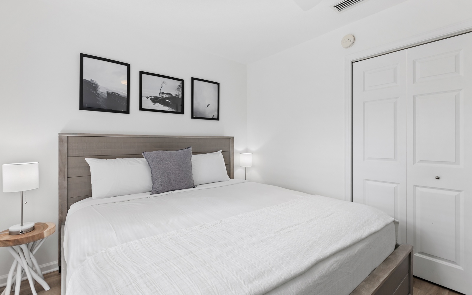 Sink into crisp white linens and wake refreshed in your serene bedroom, complete with thoughtful touches and ample storage.