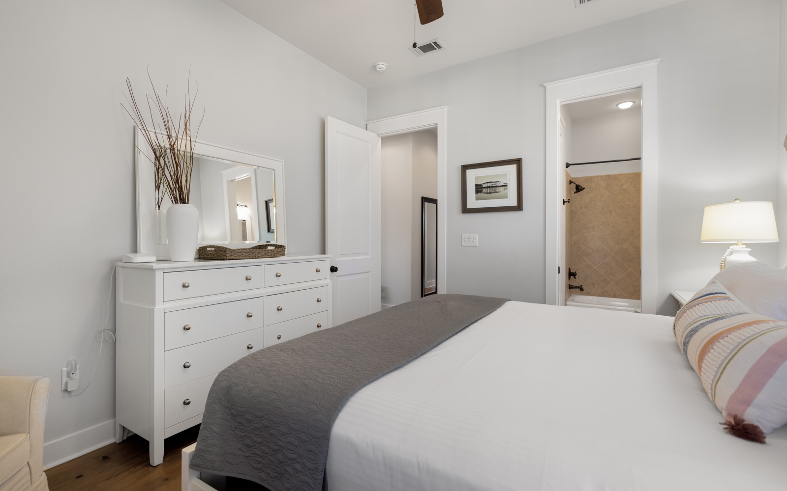 Sink into crisp linens and soft pillows in your peaceful bedroom retreat, complete with ample dresser storage for all your vacation essentials.