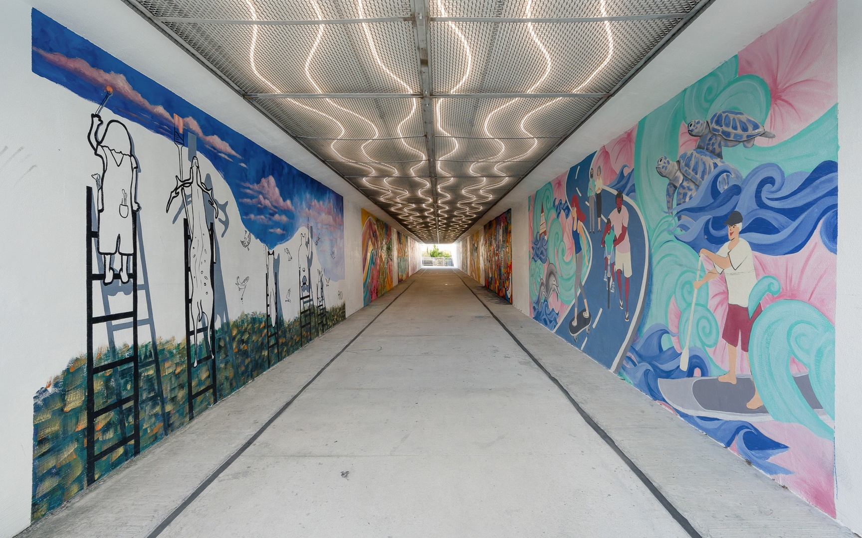 A vibrant pedestrian underpass featuring local street art connects you to nearby attractions and neighborhoods.