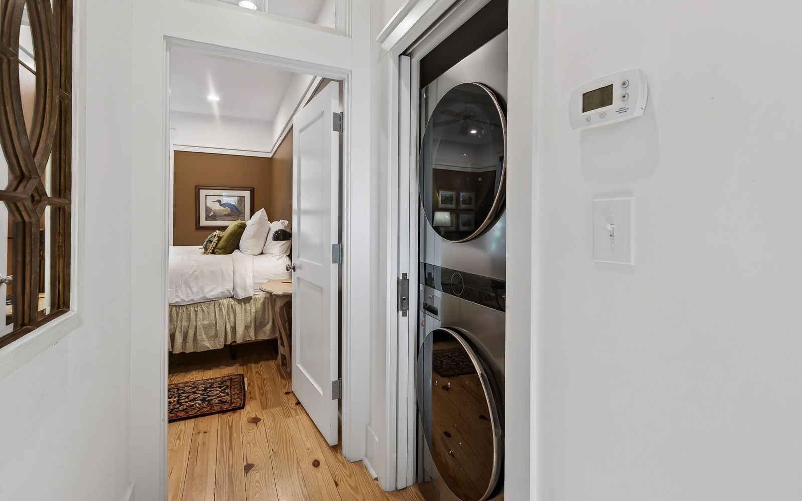 Convenient in-unit washer and dryer keep your clothes fresh throughout your stay, with your cozy bedroom just steps away.