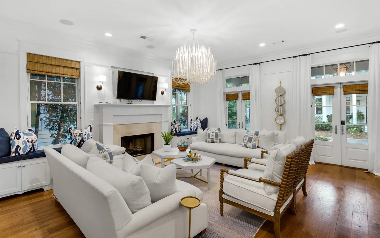 Sink into plush seating, where elegant lighting and natural views create your perfect evening retreat.