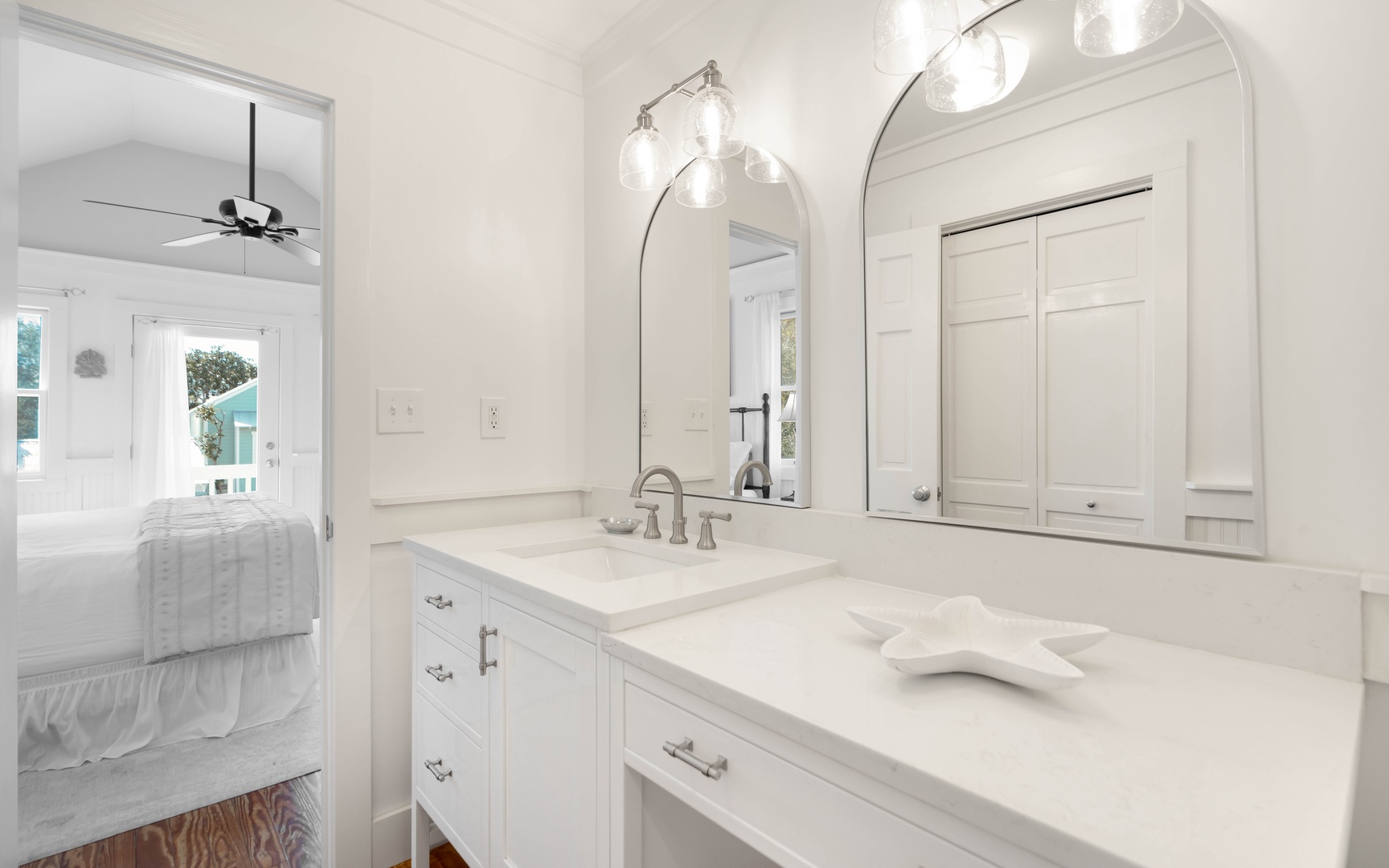 Step into your elegant ensuite bathroom with pristine marble counters and designer lighting for a luxurious morning routine.