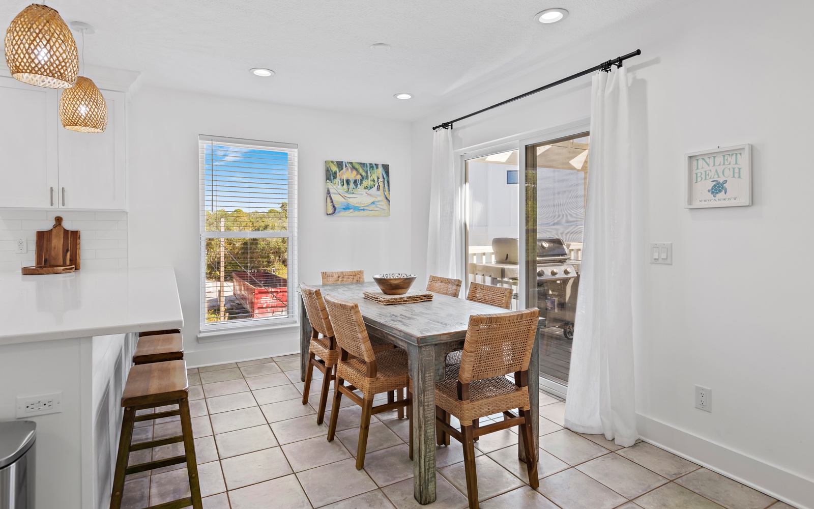 Gather around your bright dining space with woven chairs and natural textures, where meals feel like celebrations.