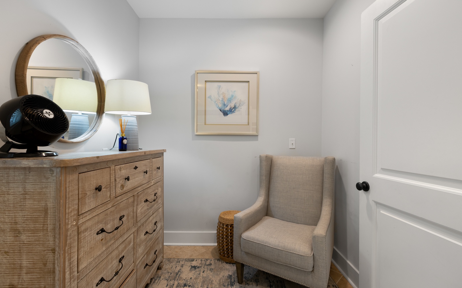 Relax in your cozy reading nook with comfortable seating and thoughtful touches that make this space feel like home.