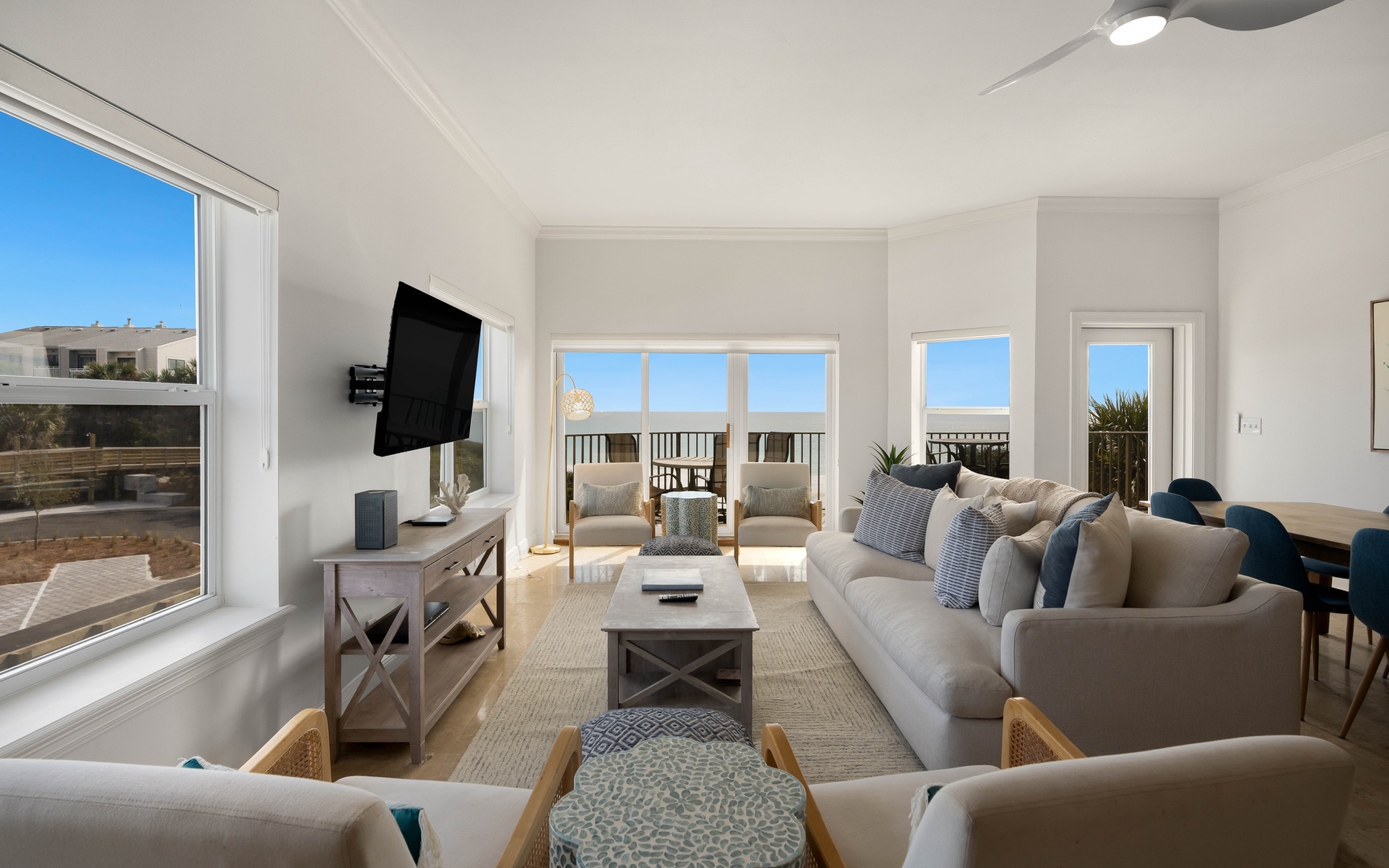 Unwind in your bright, airy living room where coastal comfort meets modern style, complete with plush seating and stunning views.