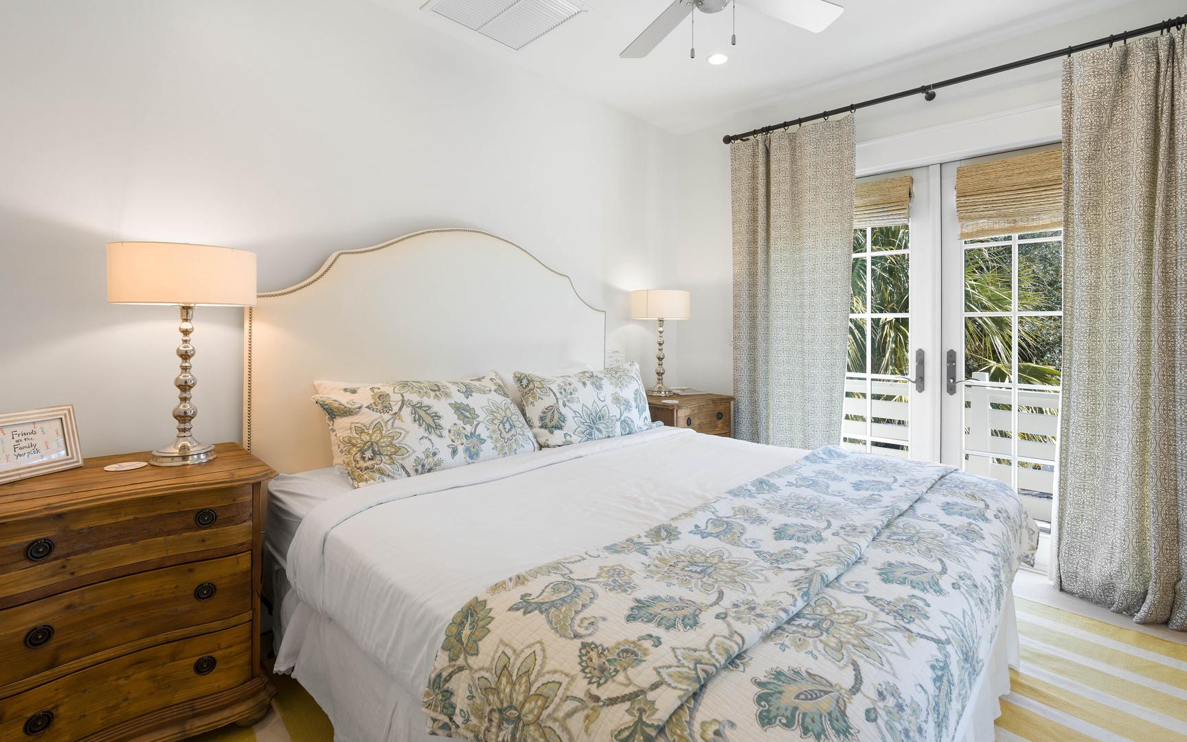 Drift off to sleep in your tranquil bedroom with soft botanical linens and French doors opening to your private balcony.