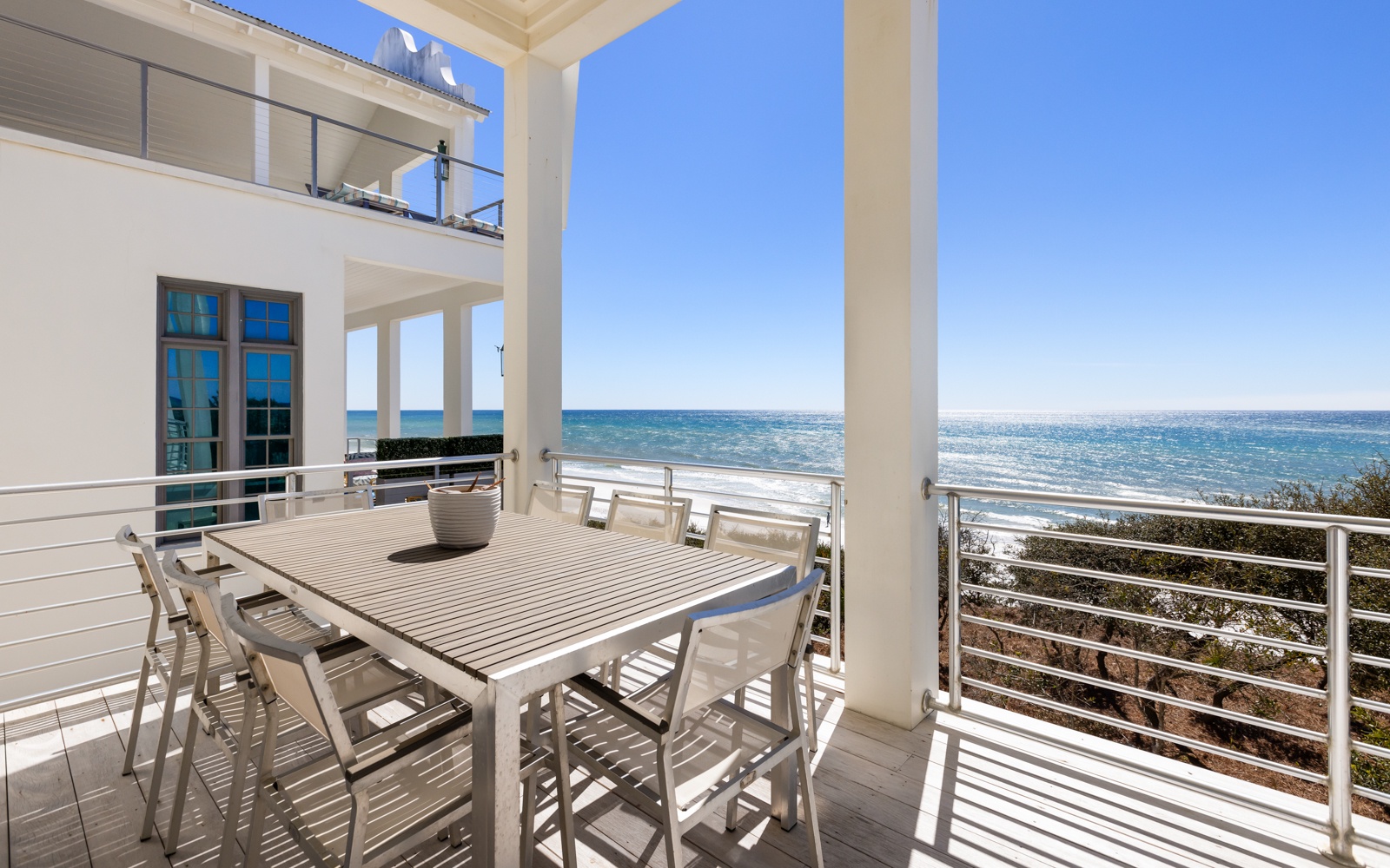 Enjoy seaside dining on your private terrace with panoramic gulf views and gentle sea breezes.