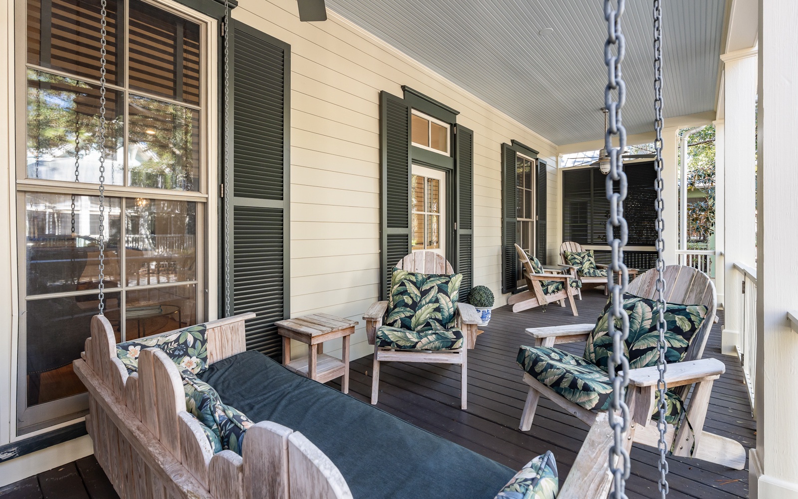Unwind on your private porch with comfortable seating and peaceful street views, perfect for morning coffee or evening relaxation.