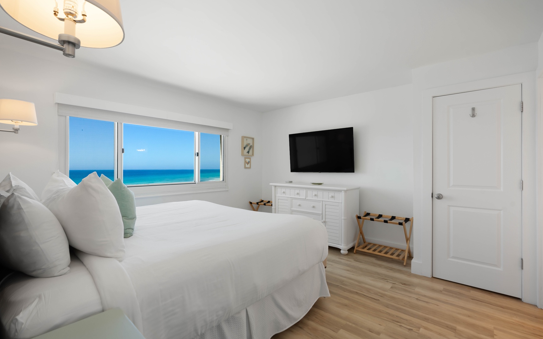 Wake up to stunning ocean views from your comfortable bed, with crisp linens and peaceful blue waters just outside your window.