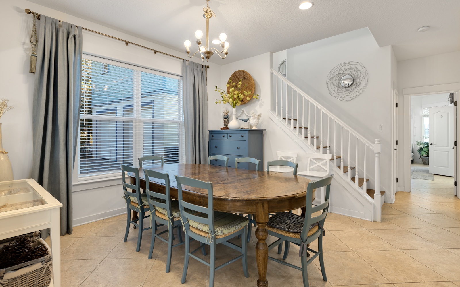 Gather around your spacious dining table for memorable meals with family and friends in this bright, welcoming space.