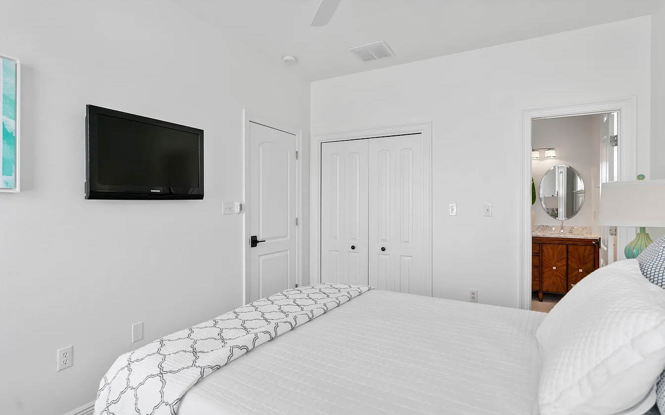 Unwind in your bright bedroom with wall-mounted TV for evening entertainment and wardrobe for organizing your belongings.